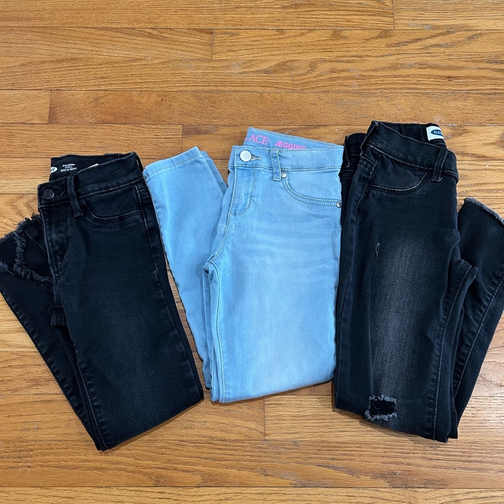 Three pairs of girls jeans. All size 8.